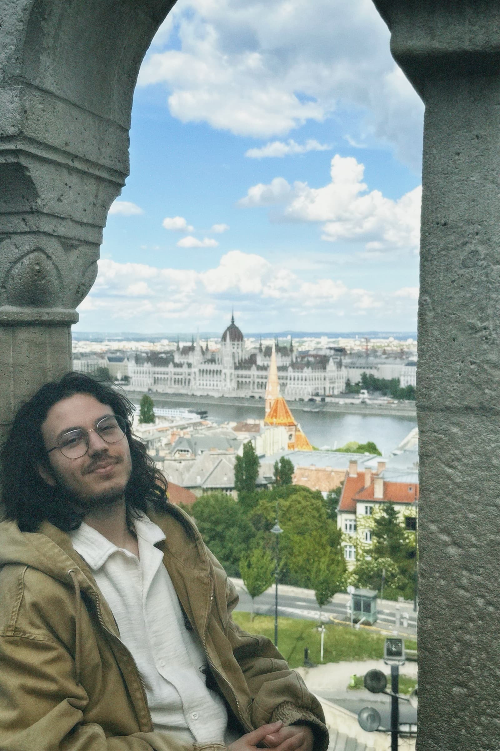 Akıncan framed in an arch at Fisherman’s Bastion, Budapest