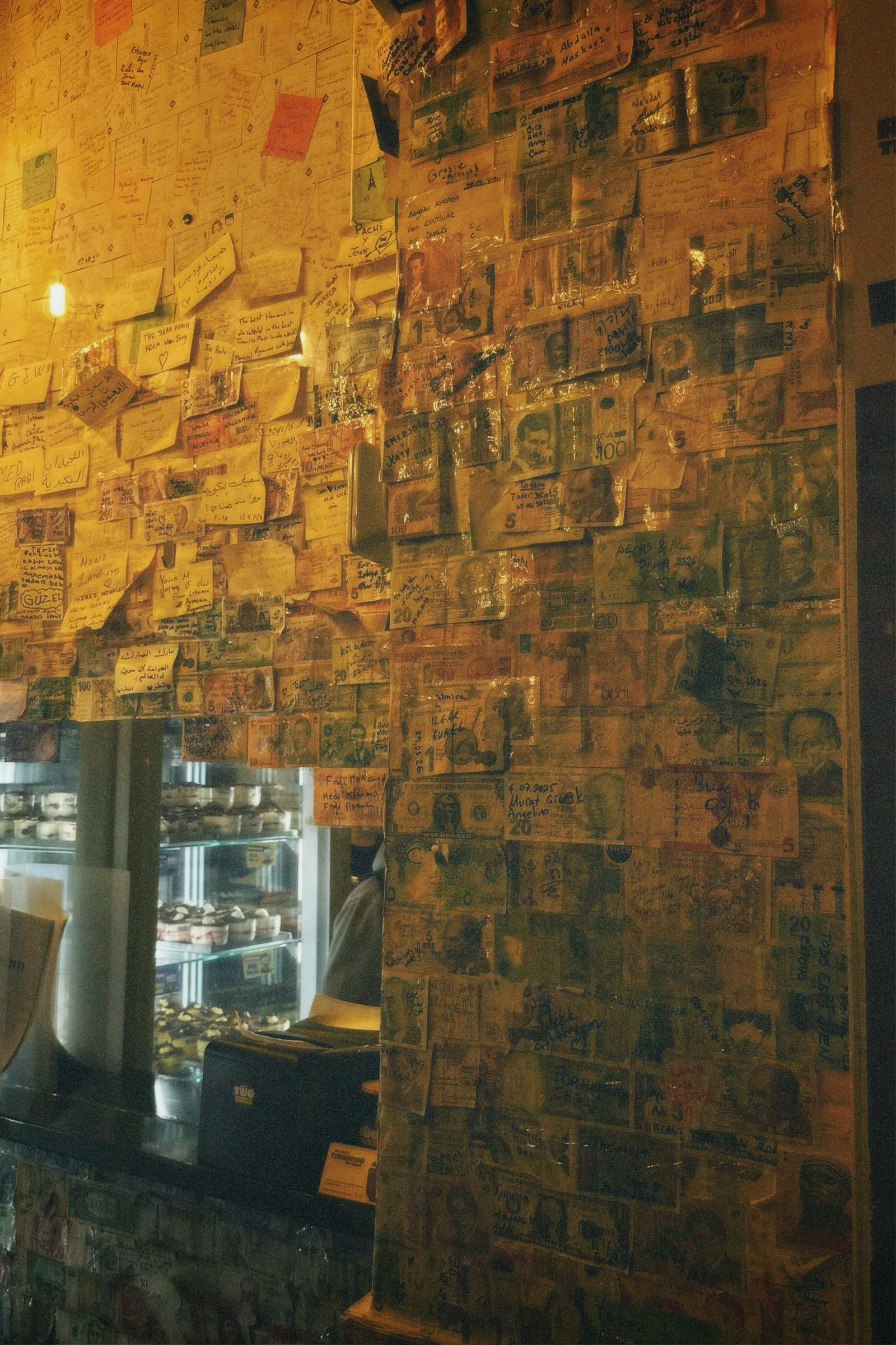 Wall covered in banknotes, Rome