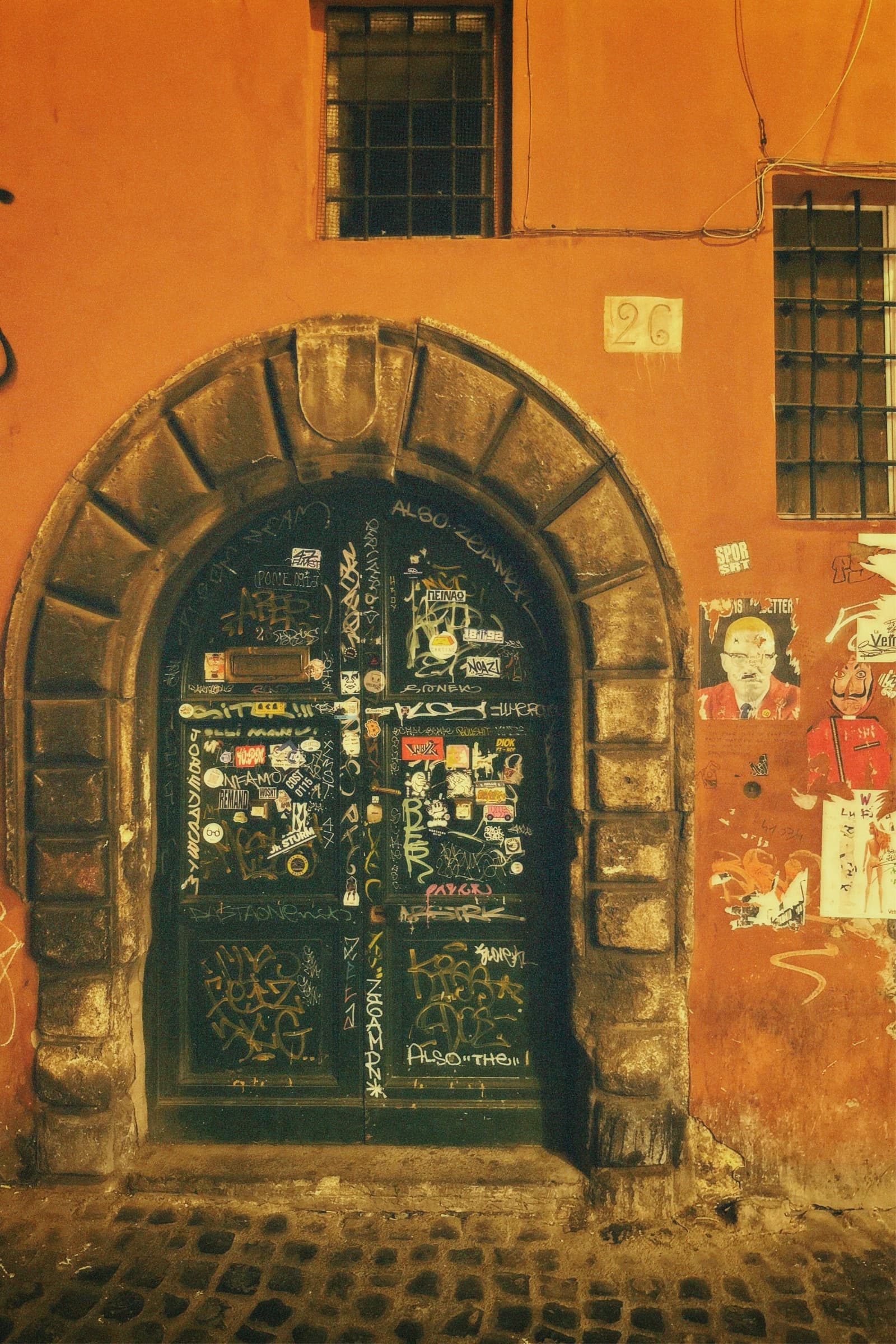 Sticker-covered door, Rome