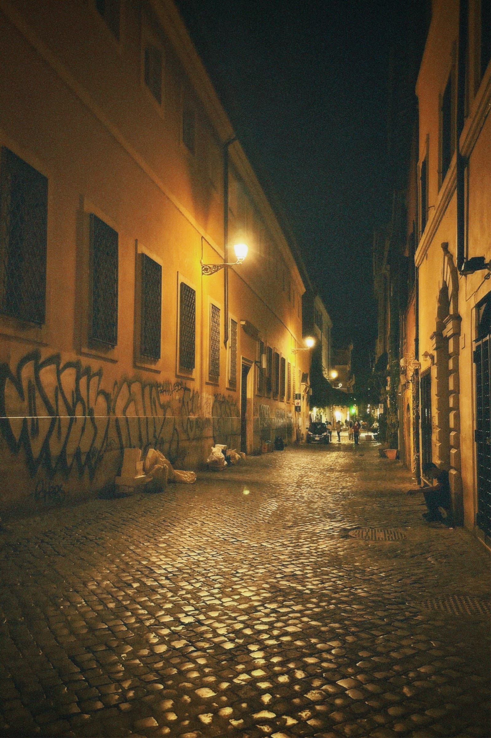 Empty cobbled street at night, Rome